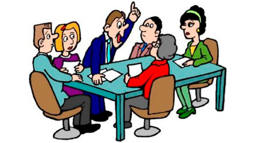 Moderador falando para outras 5 pessoas sentadas ao redor de uma mesa azul